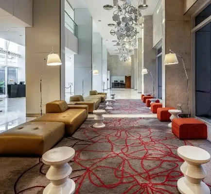Seating at the Dorsett Changi City Singapore lobby and reception.